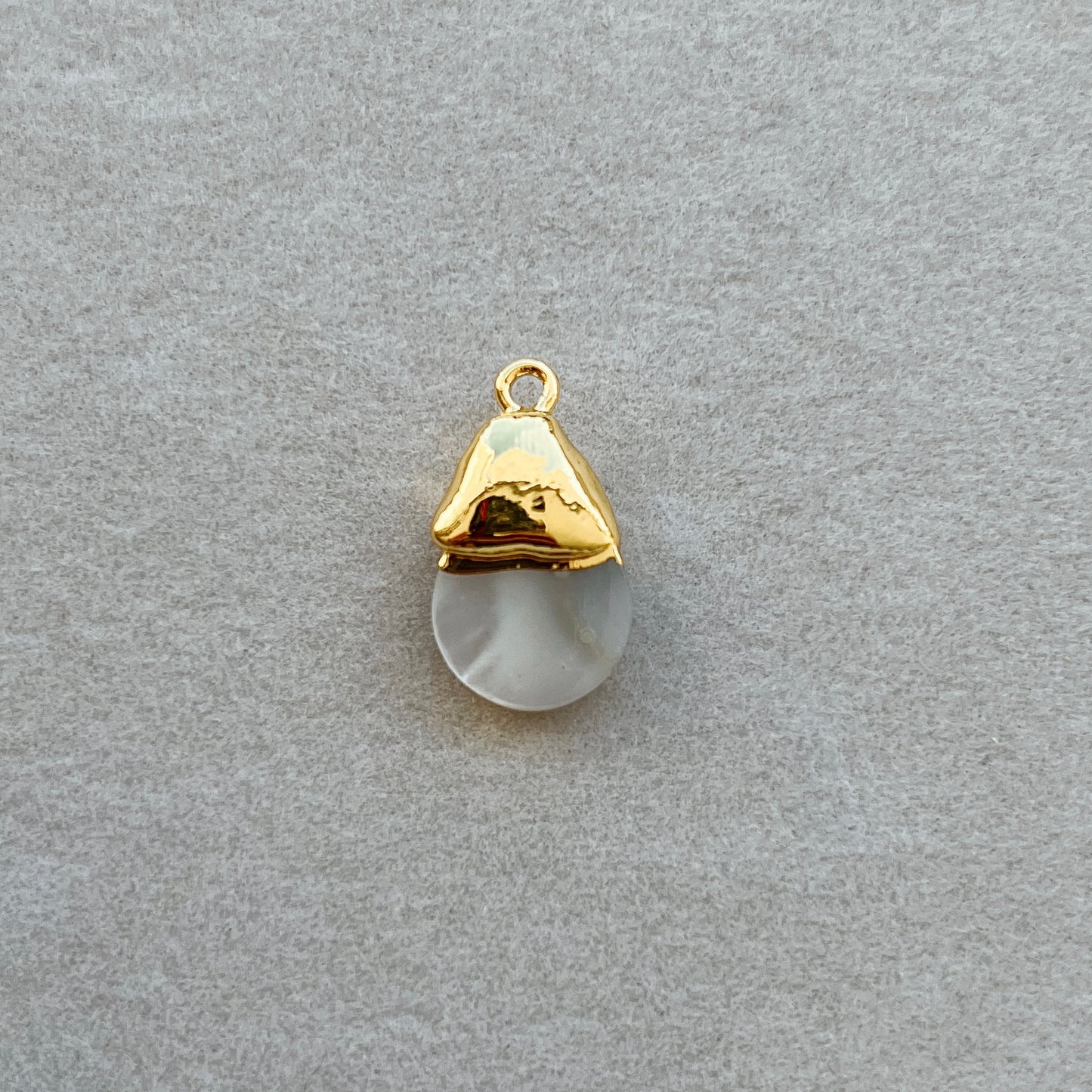 Gold teardrop pearl