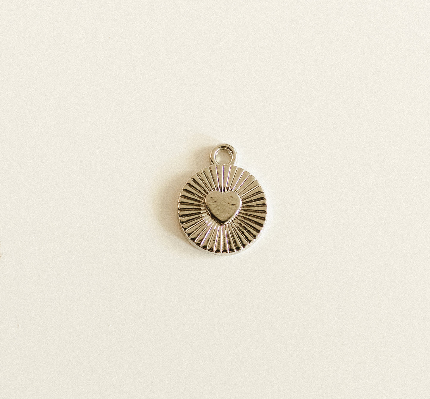 Small silver heart circle