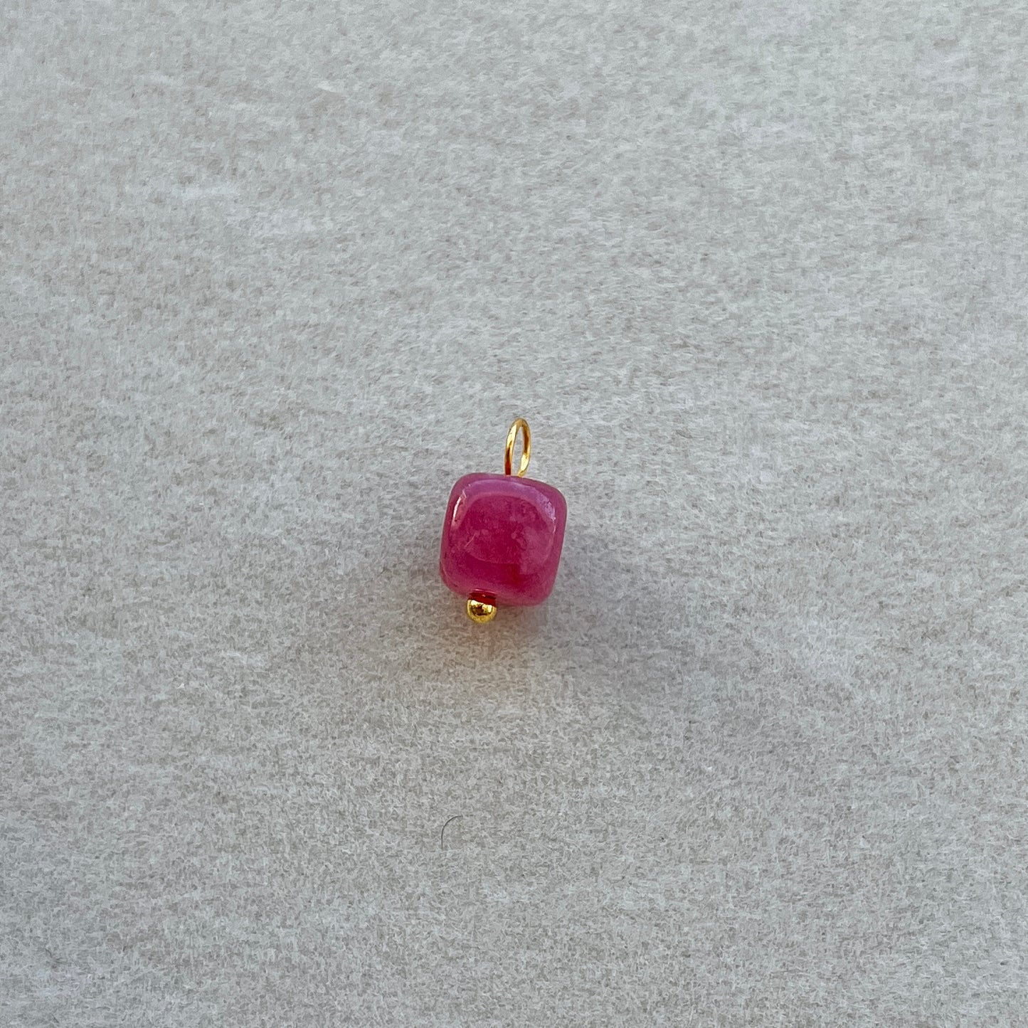 Small gold pink gem