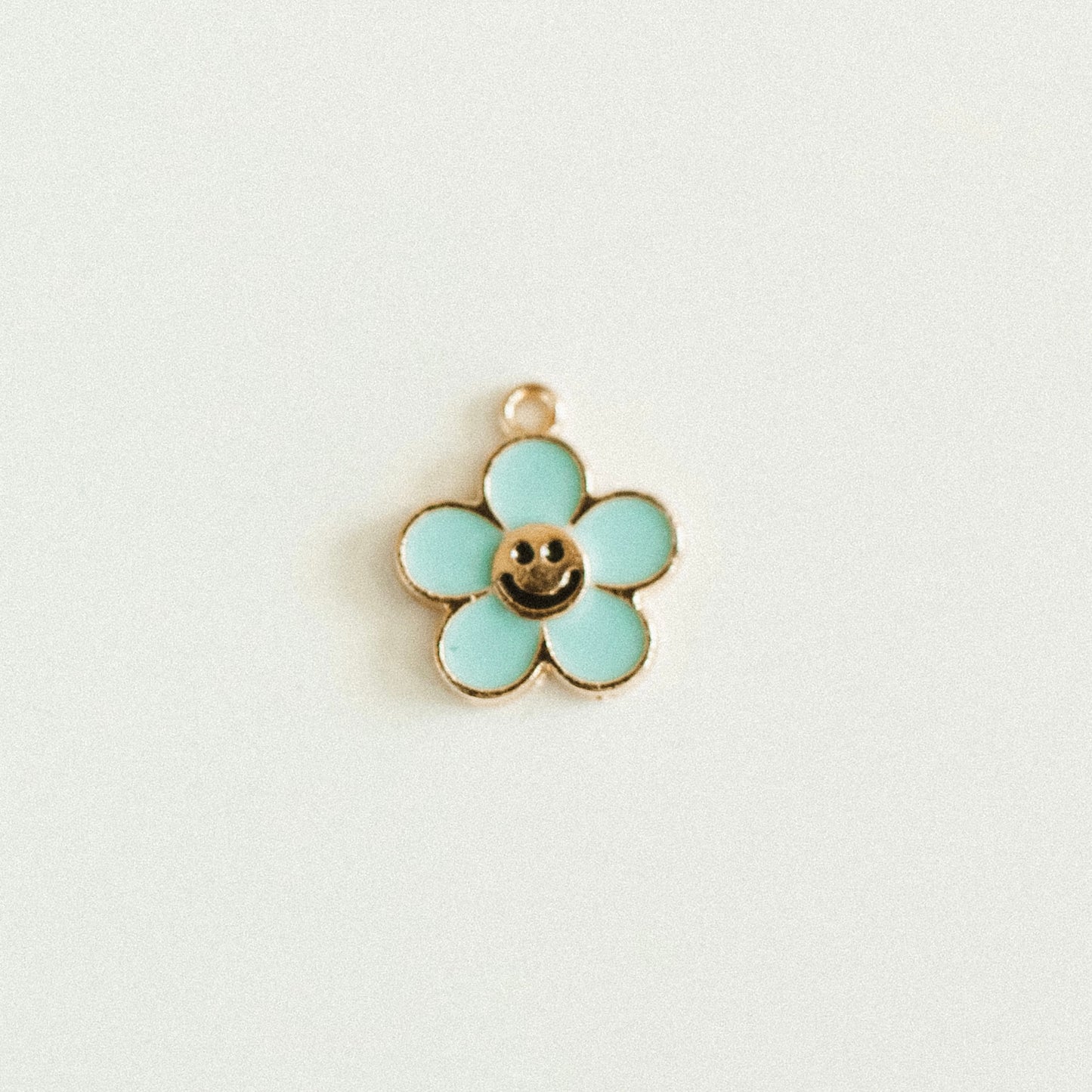 Gold blue smiley flower