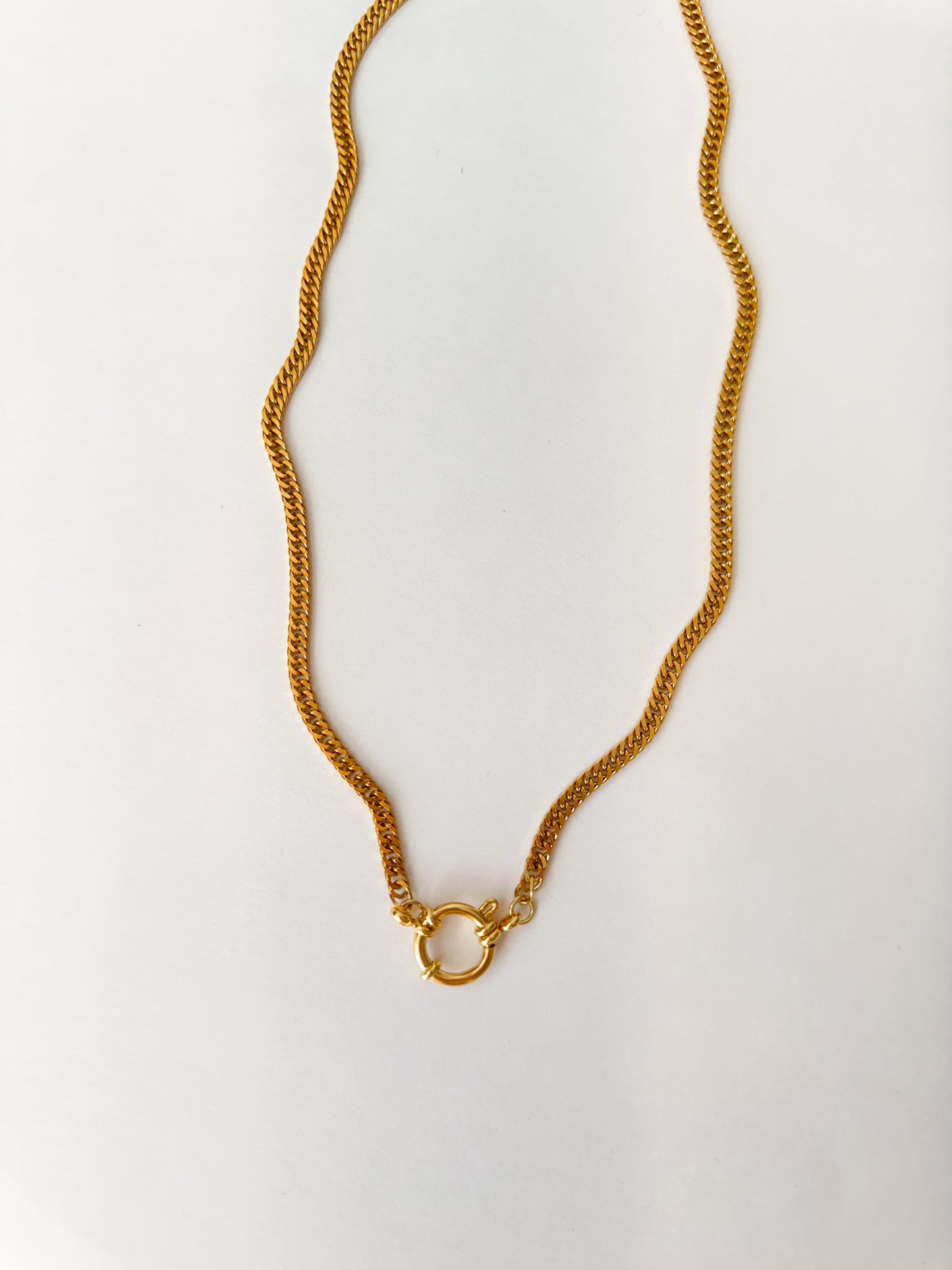 Gold figaro charm clip necklace