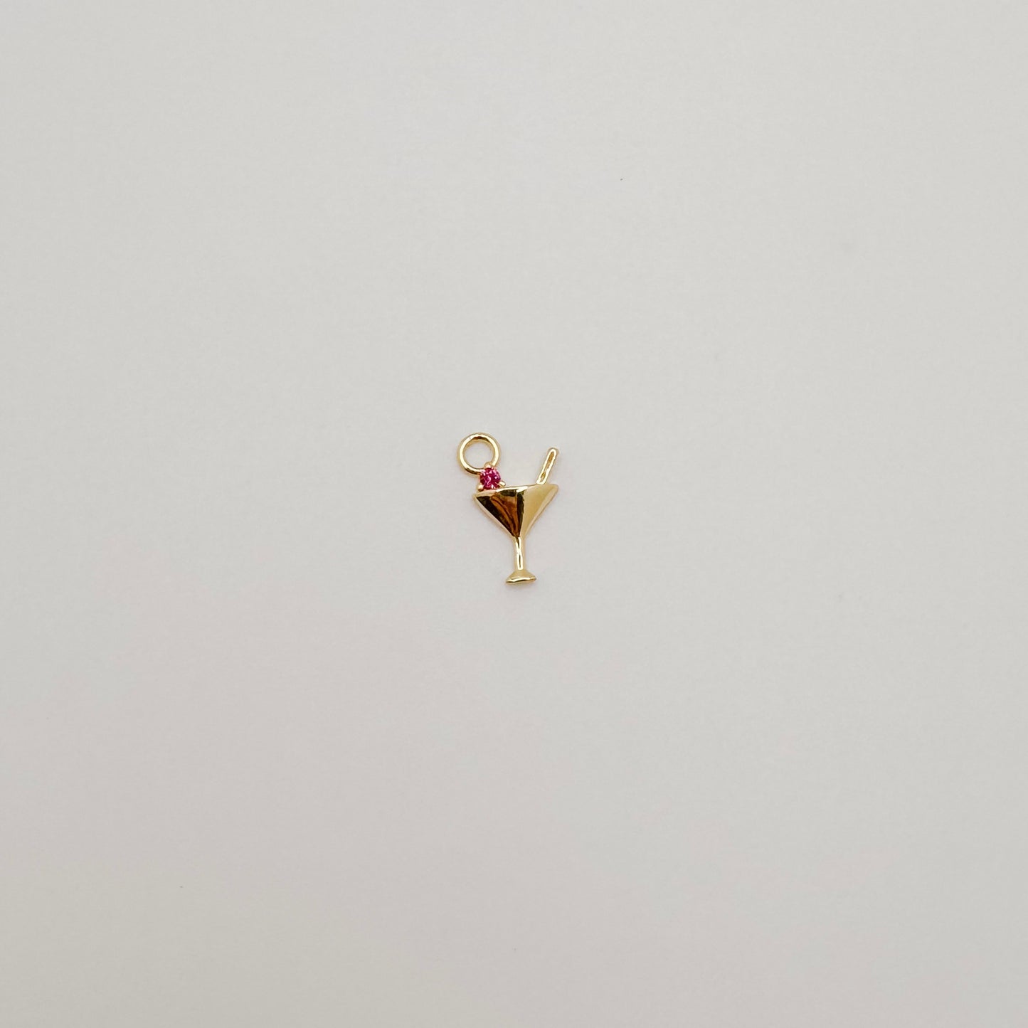 Tiny gold martini glass