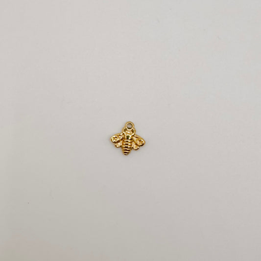 Tiny gold bee