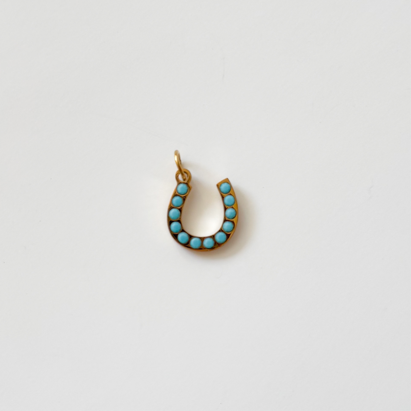 Gold turquoise horse shoe
