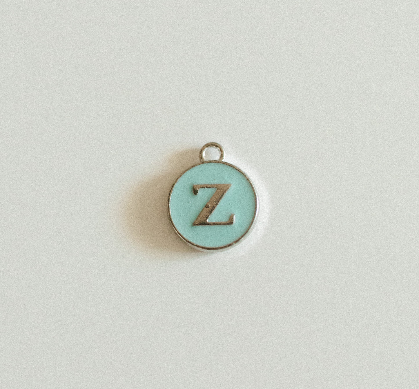 Silver blue circle letters A-Z
