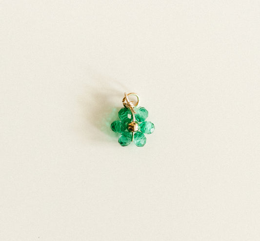 Small gold dark green bead flower