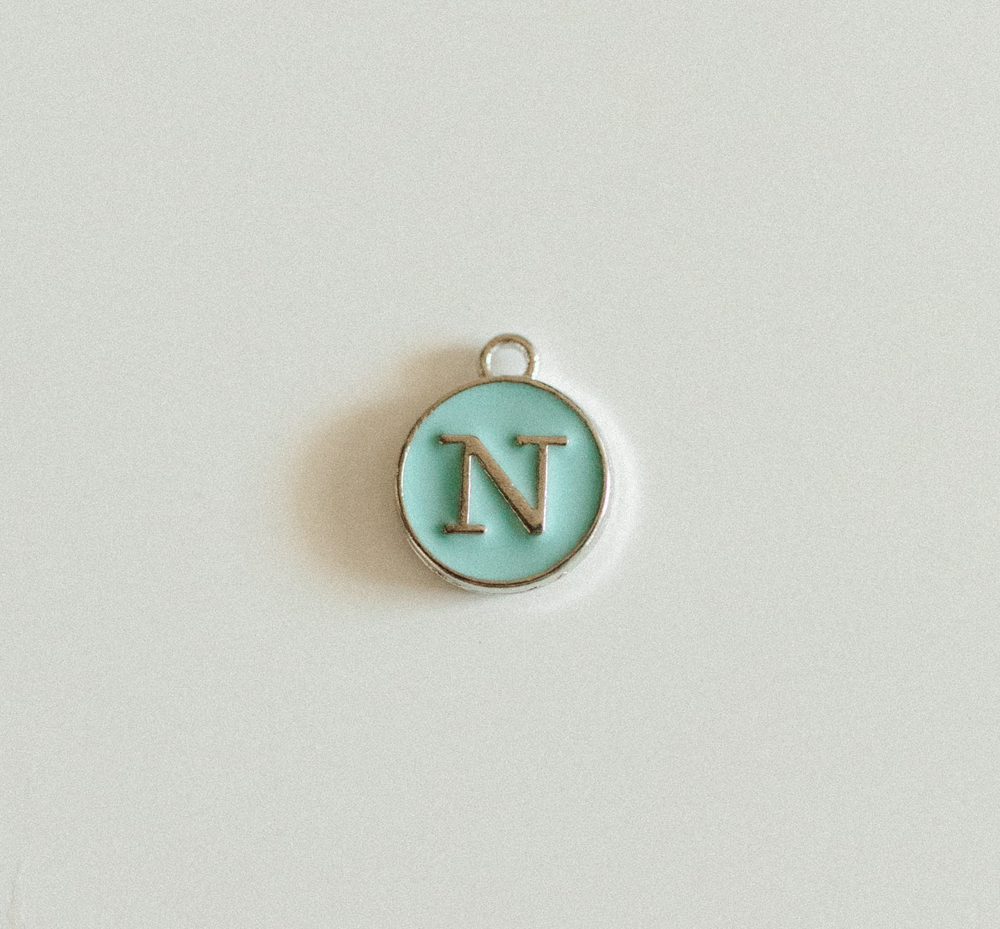 Silver blue circle letters A-Z