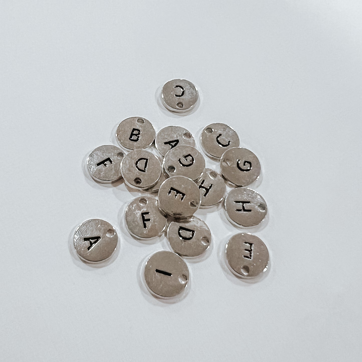Silver circle letters A-Z
