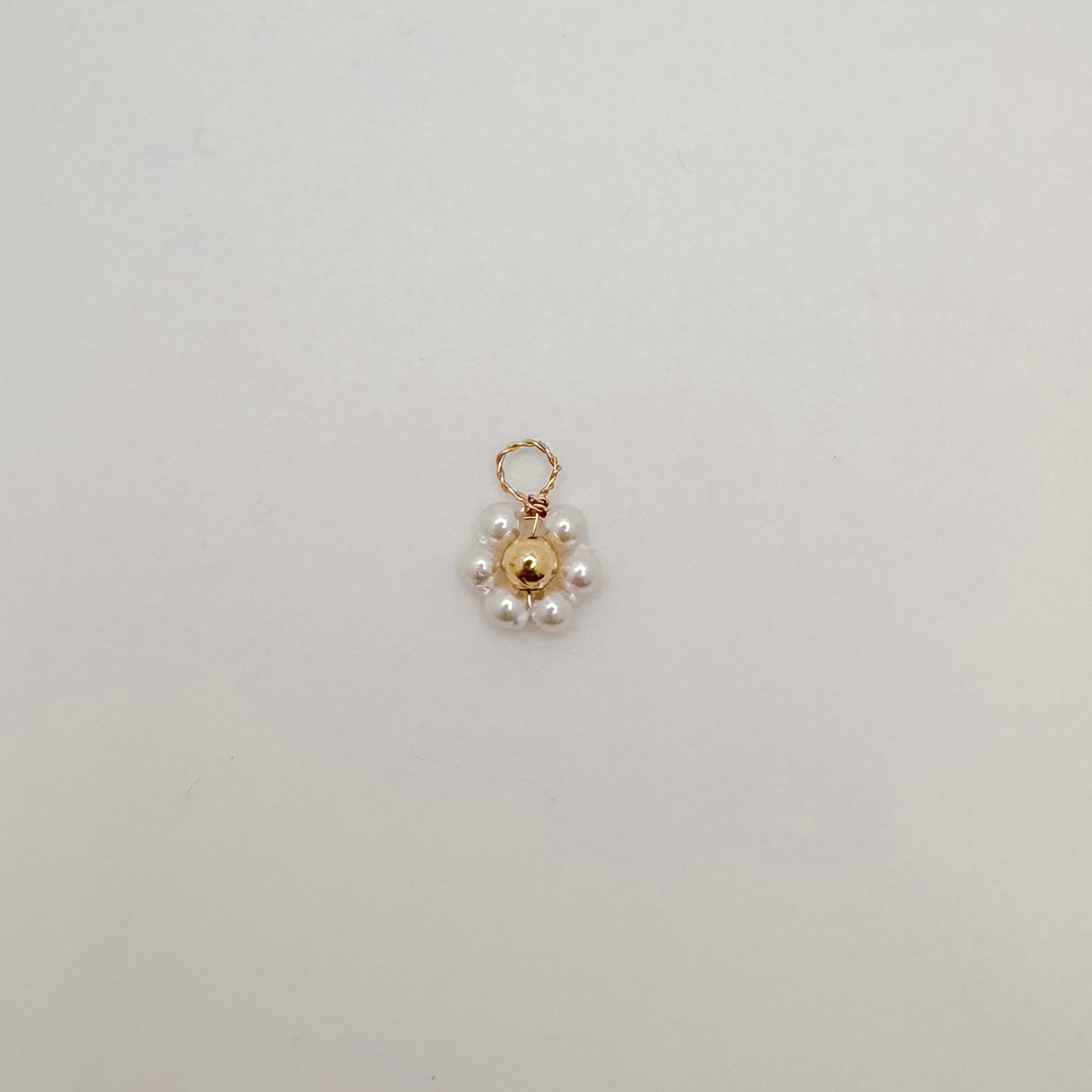 Small gold pearl flower