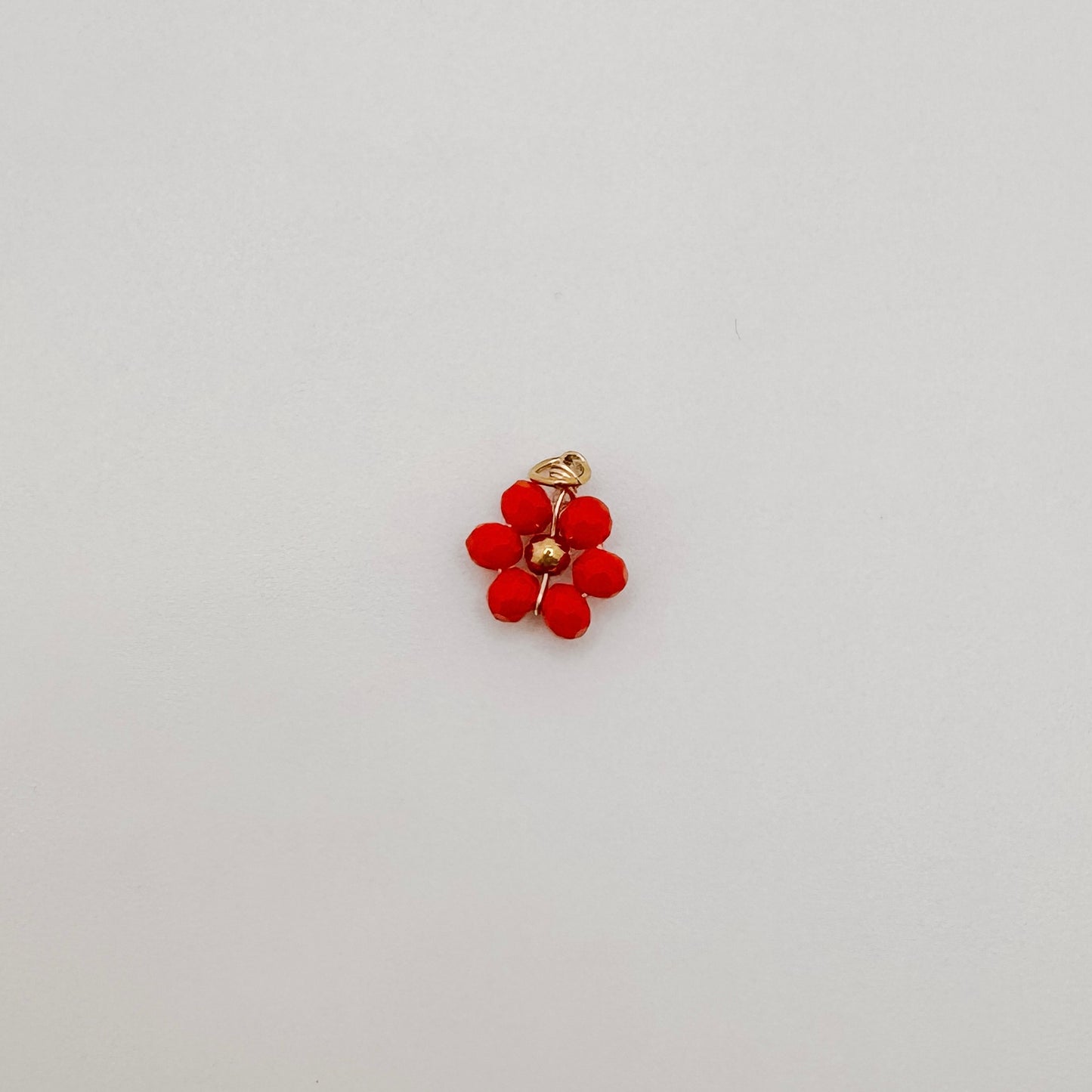 Gold red bead flower