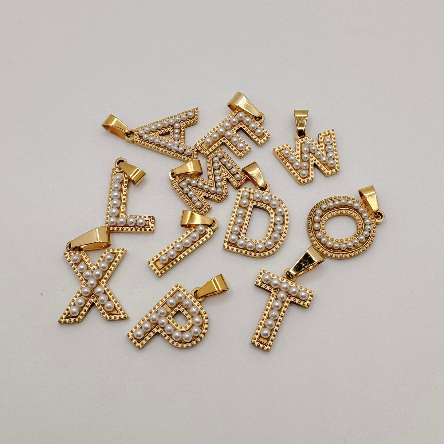 Large gold pearl lined letters A-Z