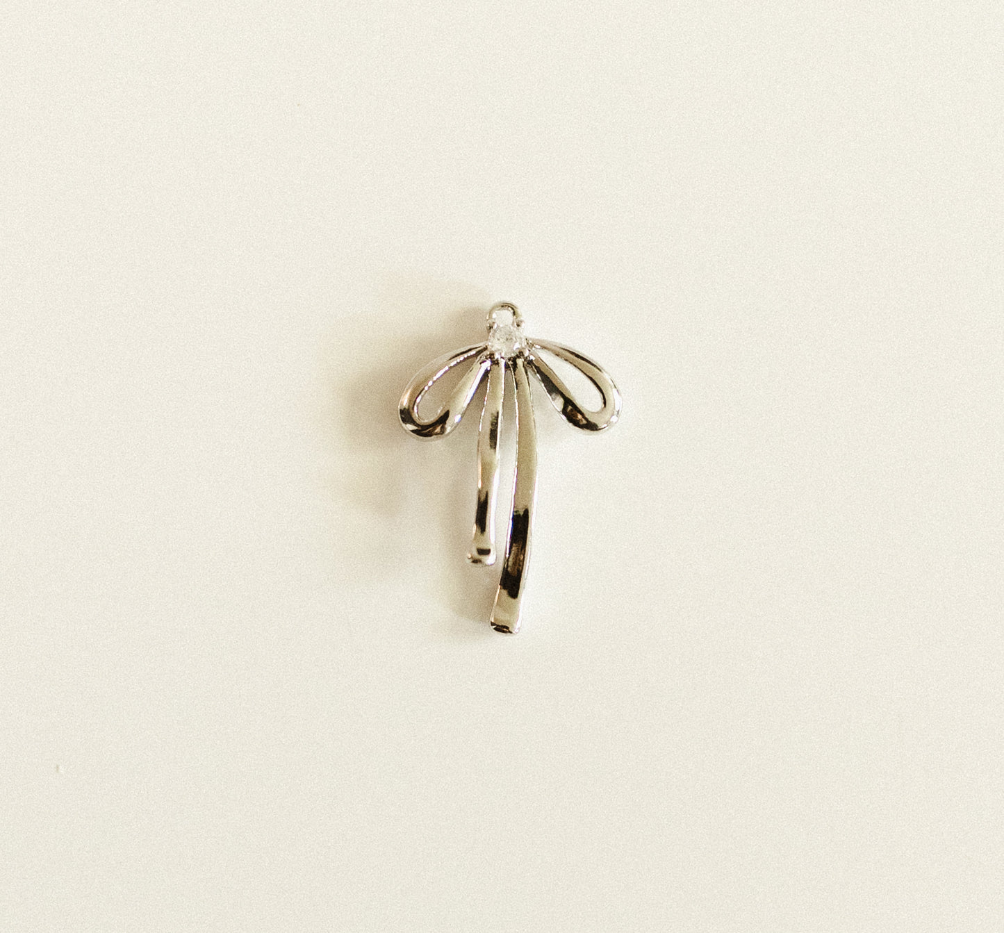 Silver bow with diamond