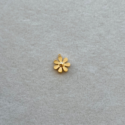Tiny gold flower
