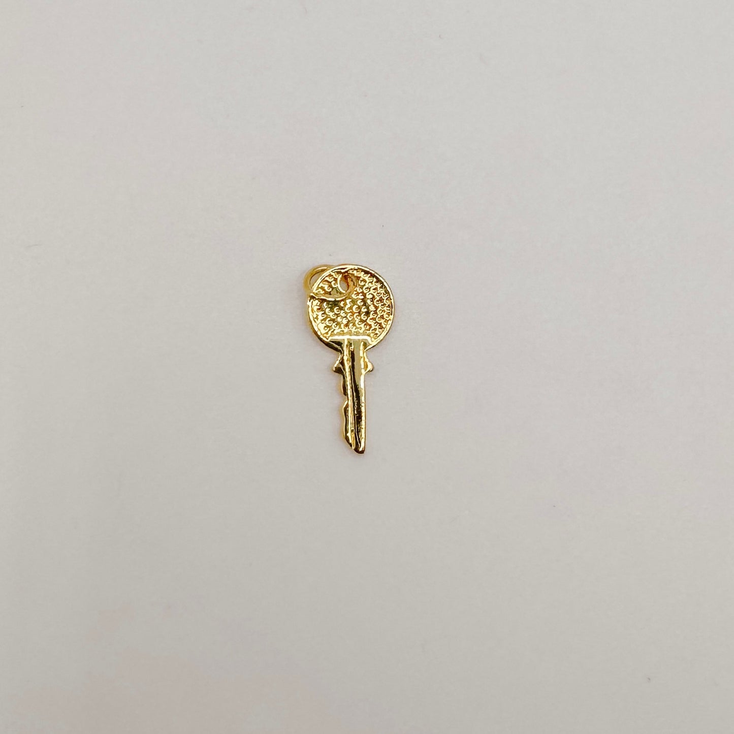 Small gold key