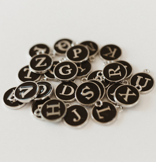 Silver black circle letters A-Z