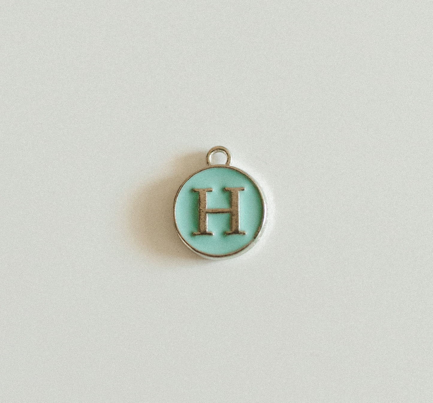 Silver blue circle letters A-Z