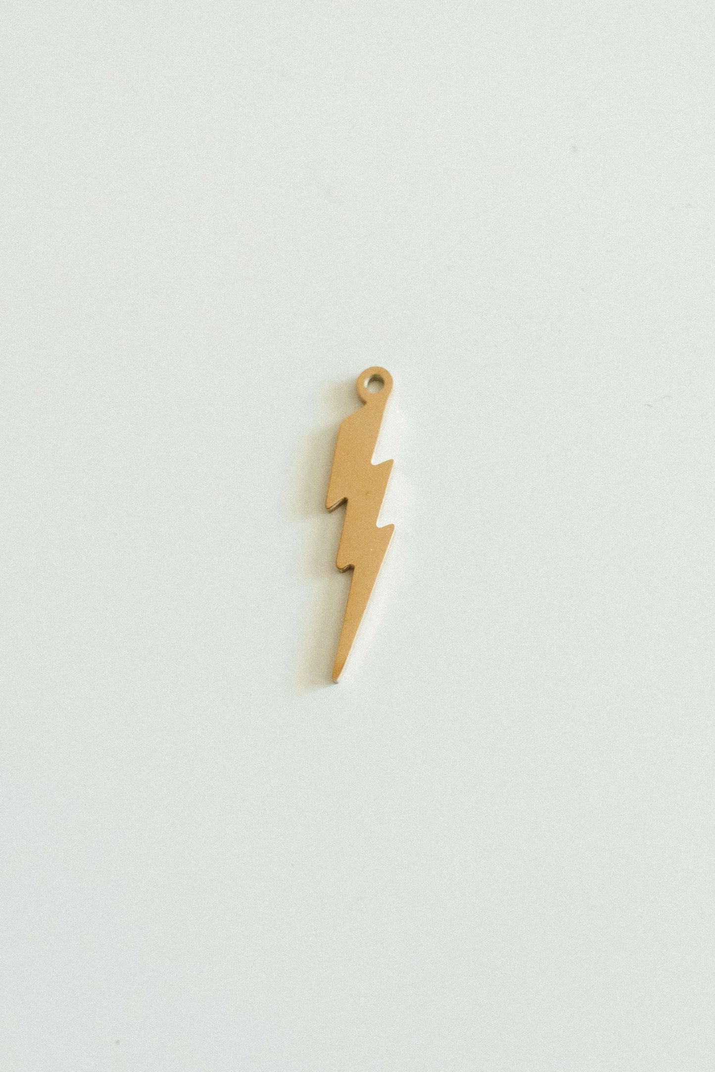 Large gold lightning bolt