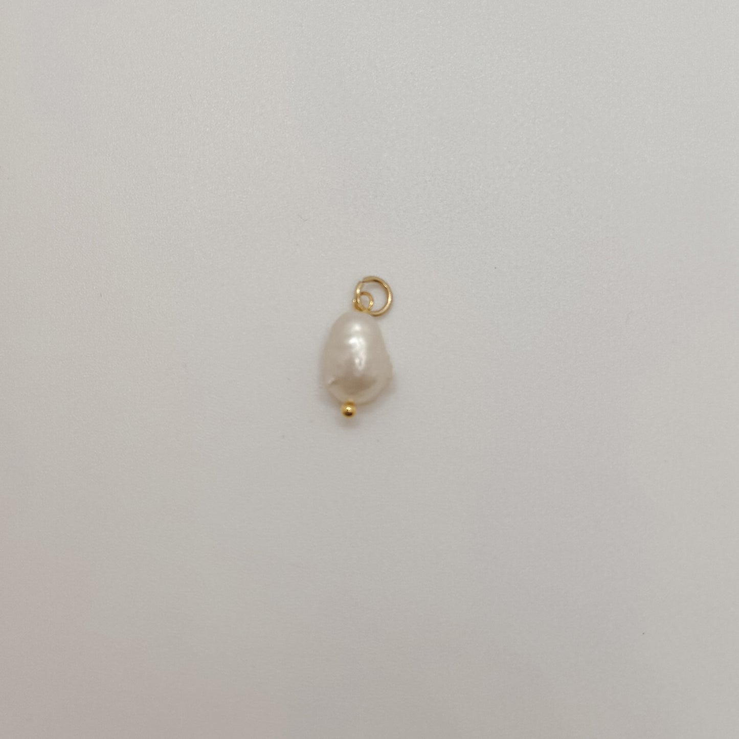 Small gold natural pearl