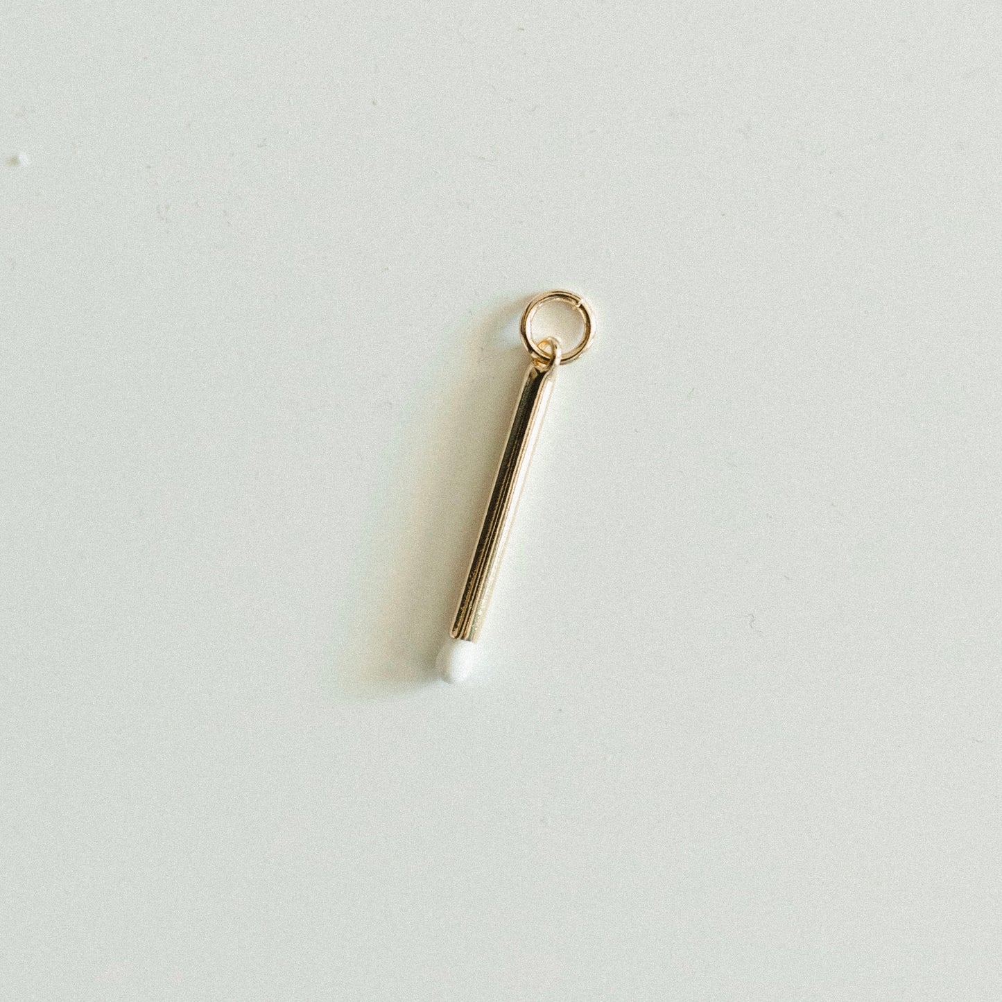 Gold & white match stick