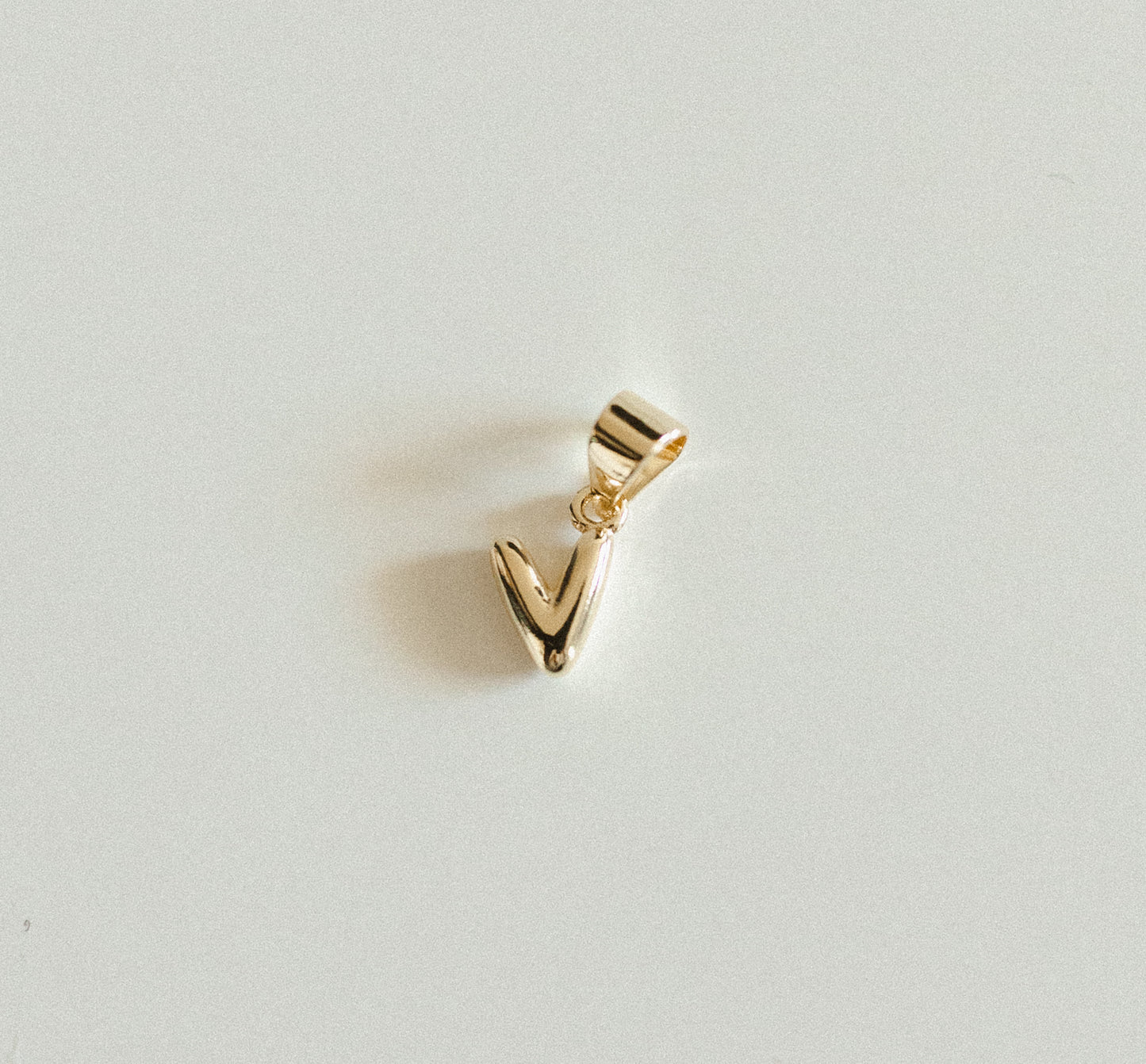 Tiny gold bubble letters A-Z