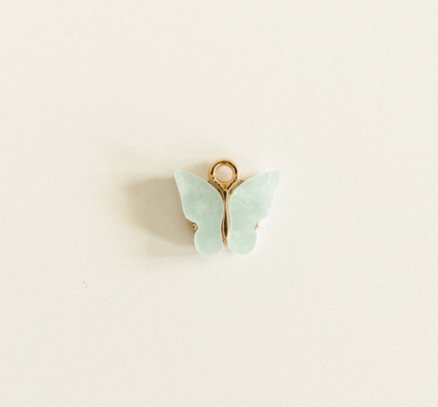 Gold light blue gem butterfly
