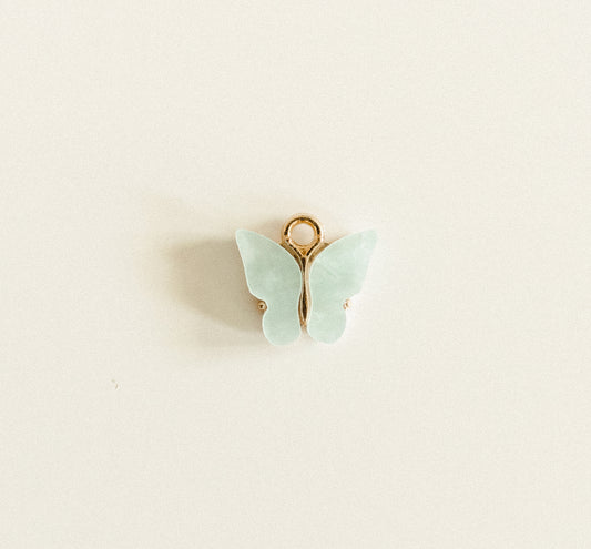 Gold light blue gem butterfly
