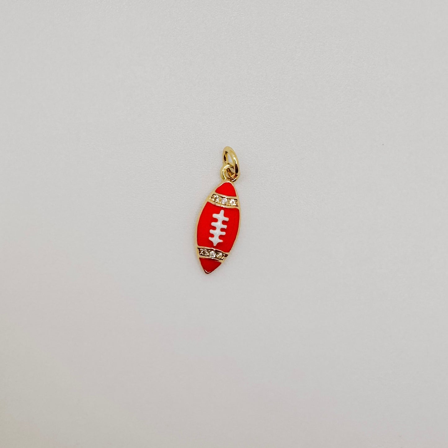 Small gold orange football