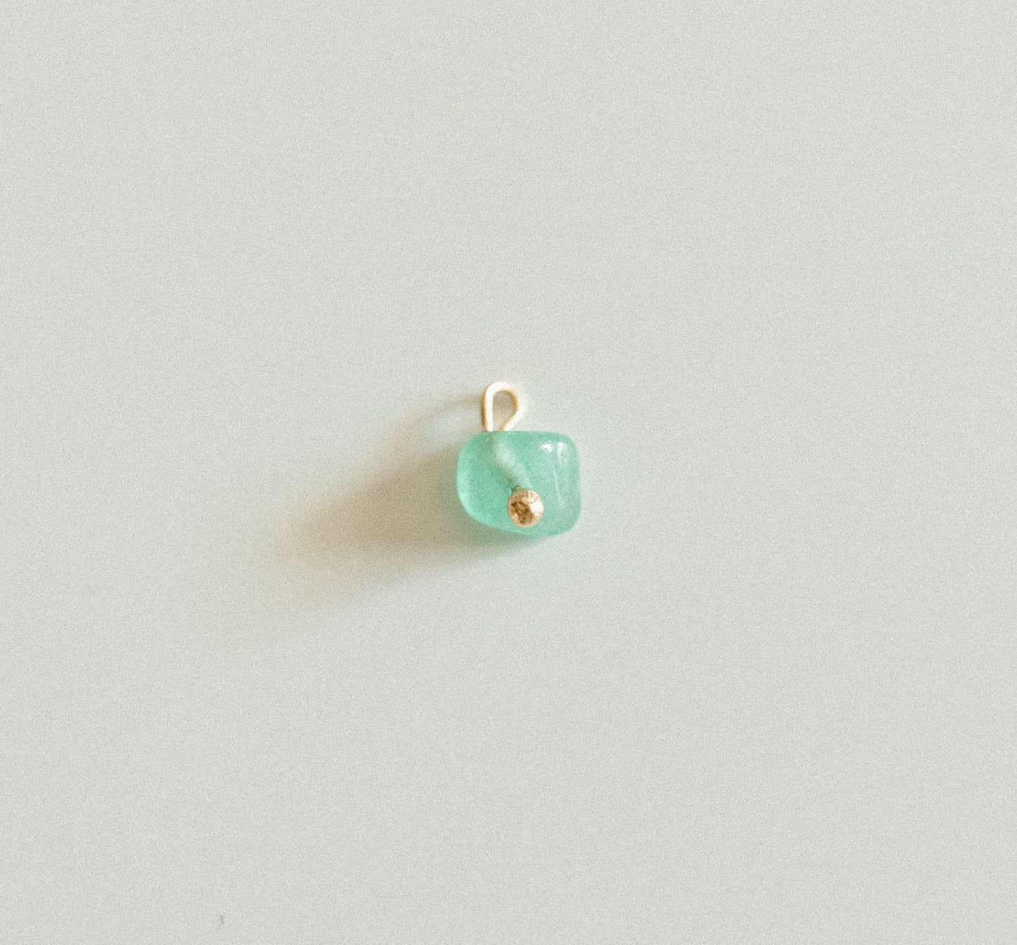 Gold teal bead