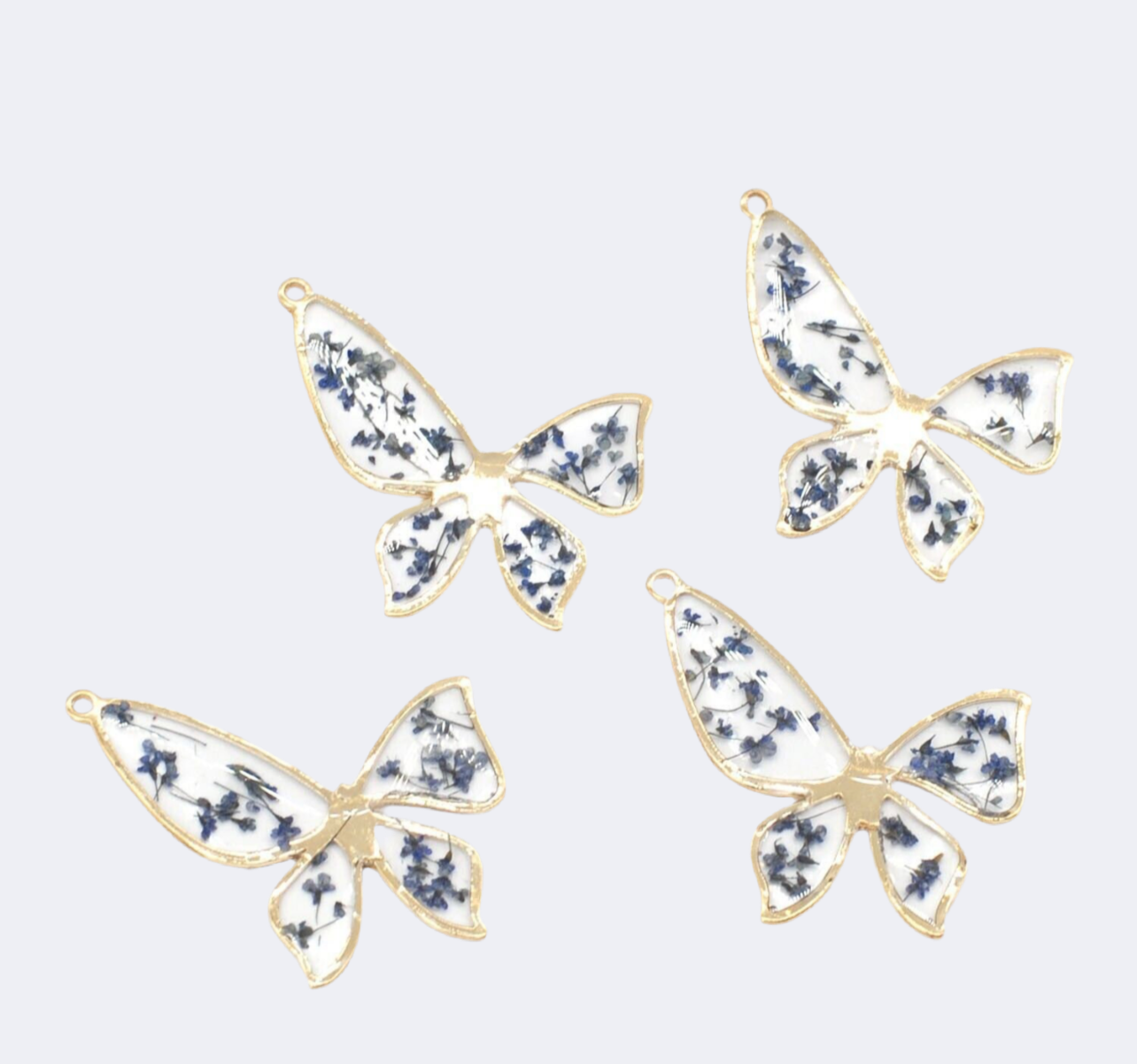 Large gold blue pressed flower butterfly