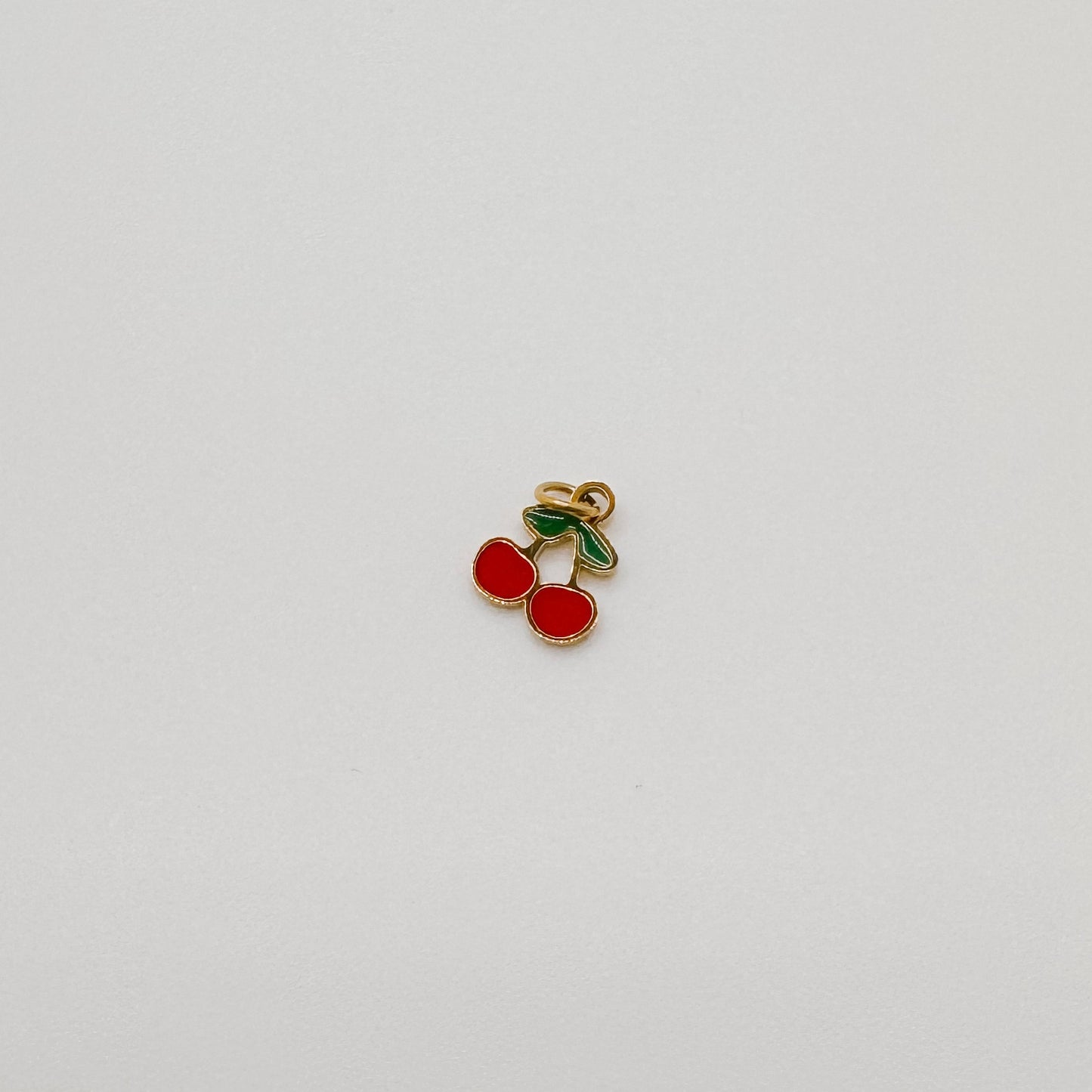 Tiny gold red cherries