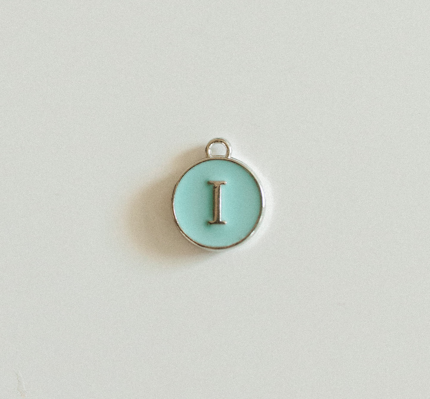 Silver blue circle letters A-Z