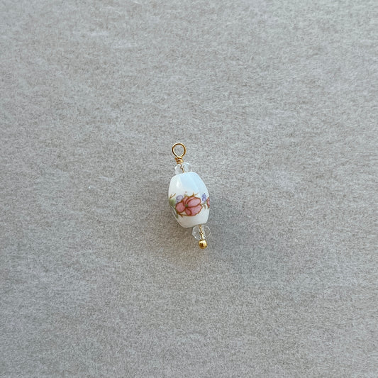 Gold white bead with pink flowers