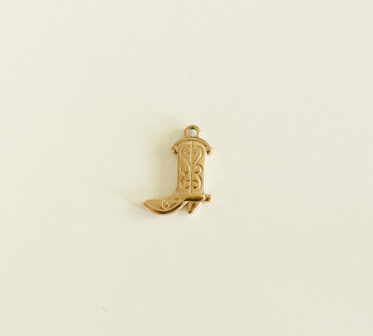 Large gold cowboy boot