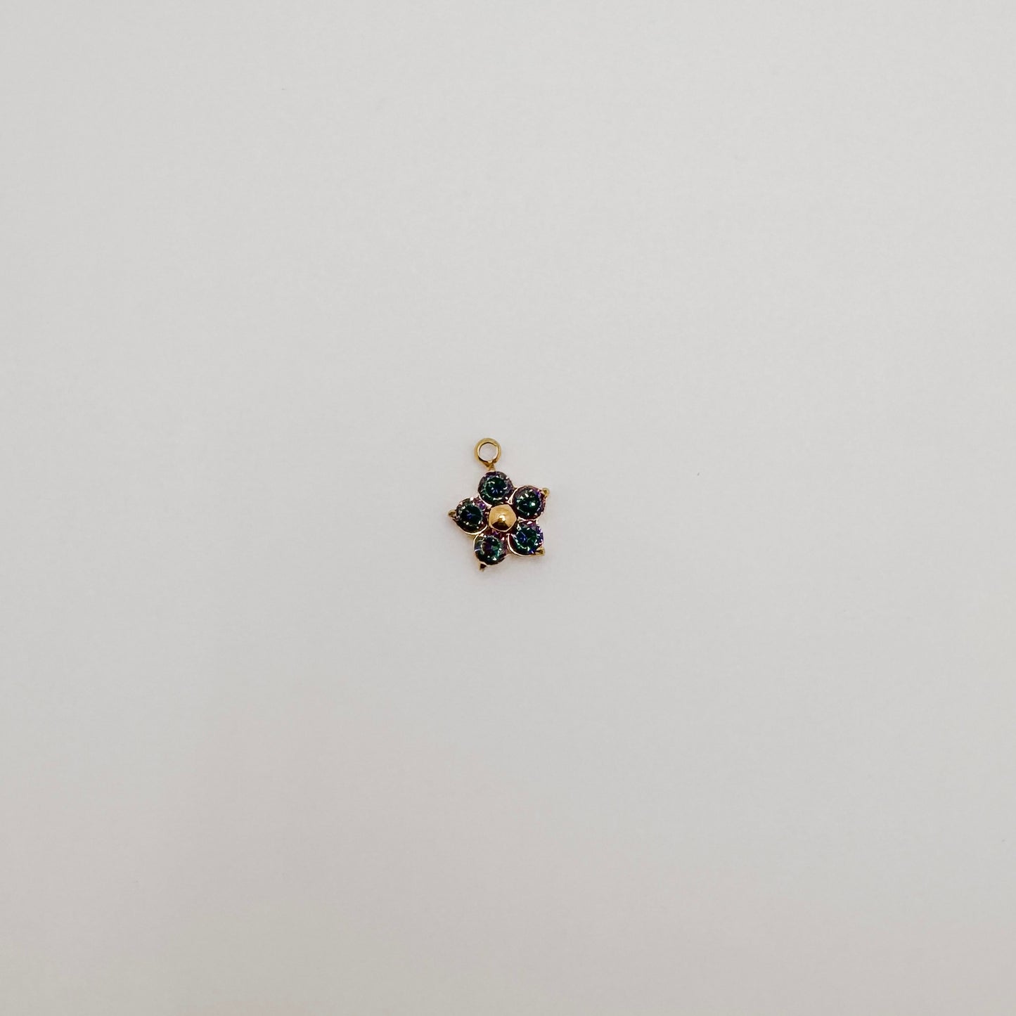 Tiny gold black diamond flower