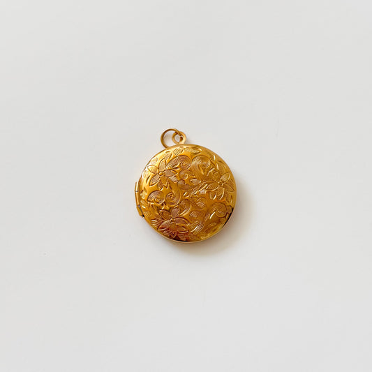 Large gold circle flower locket