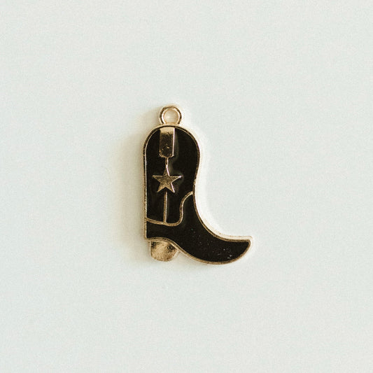 Large gold black cowboy boot