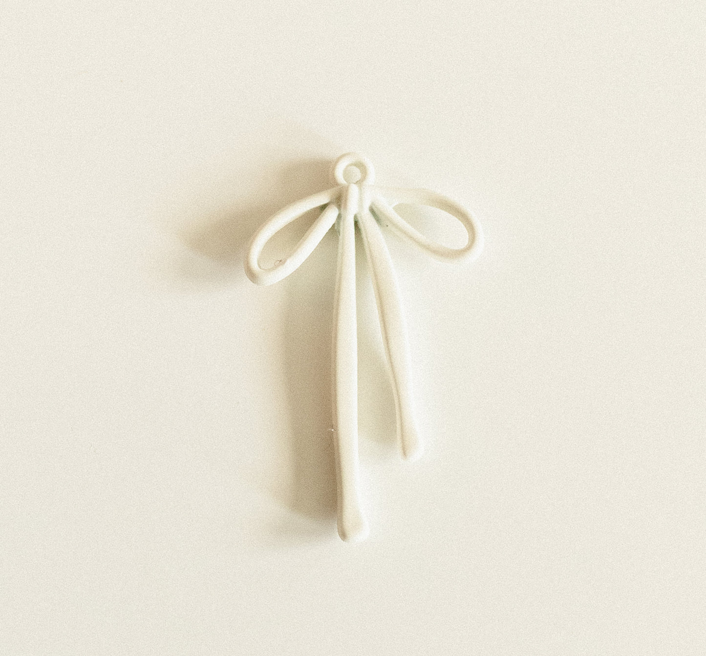 Large white droopy bow