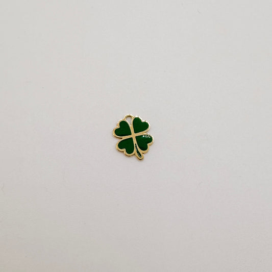 Gold green four leaf clover