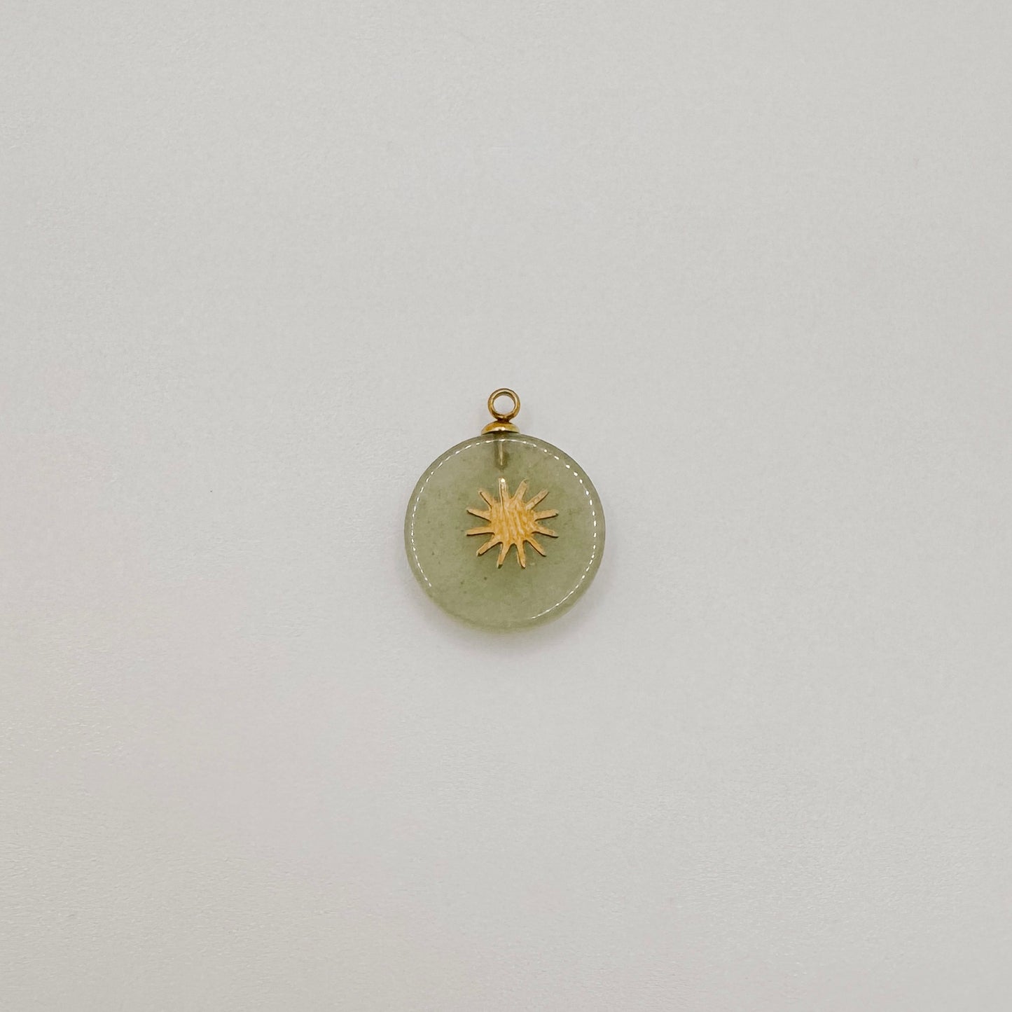 Gold green gem sun