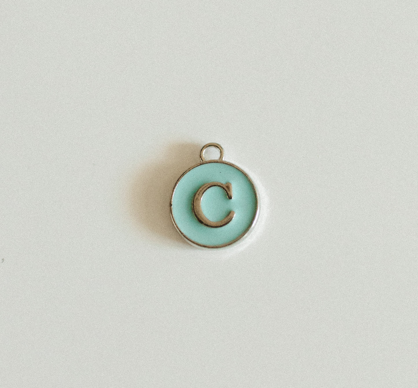 Silver blue circle letters A-Z