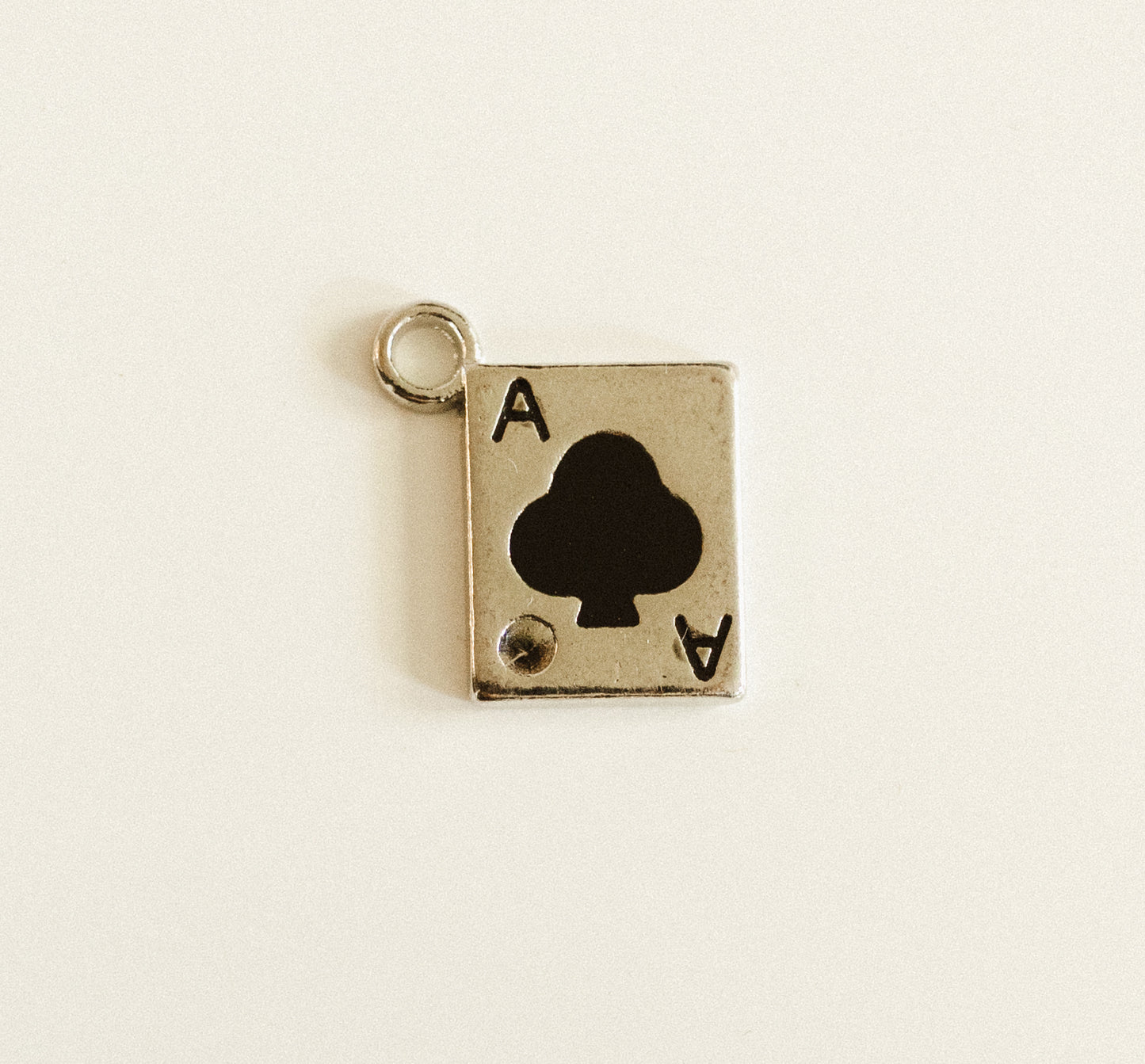 Large silver black club card