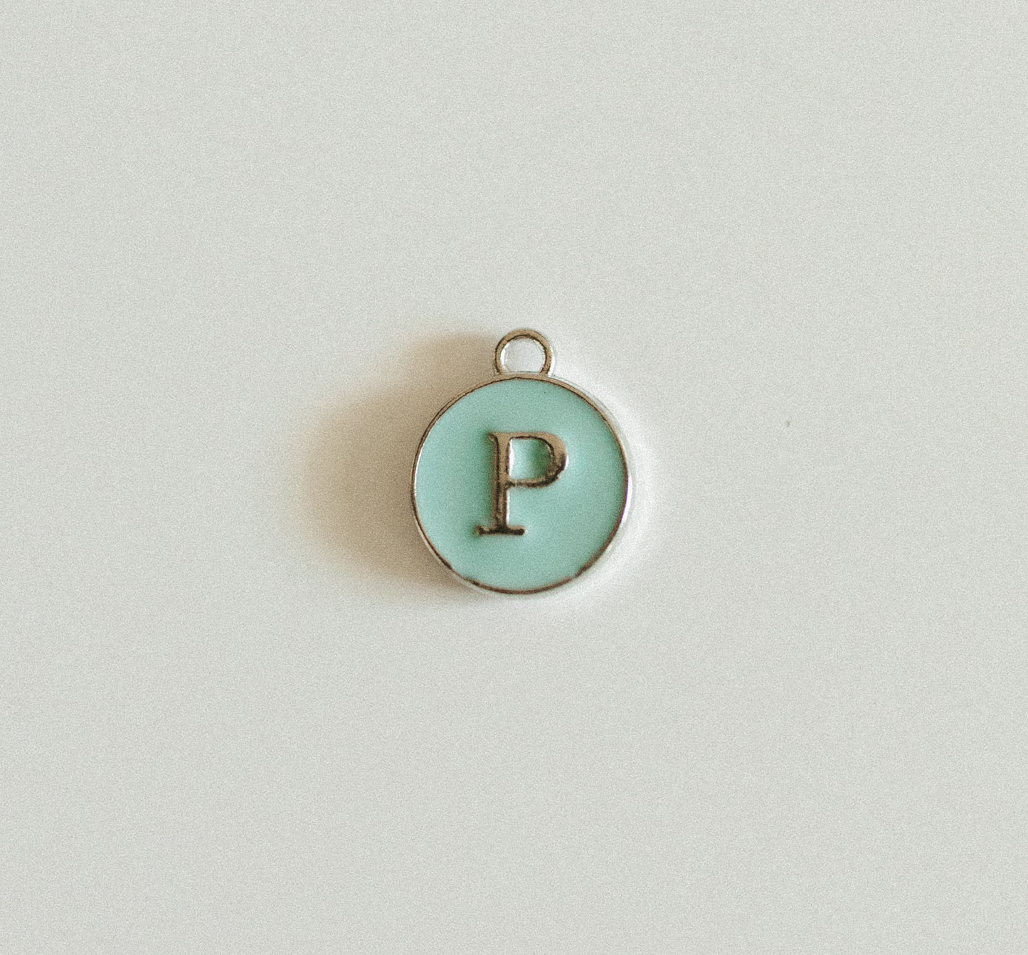 Silver blue circle letters A-Z