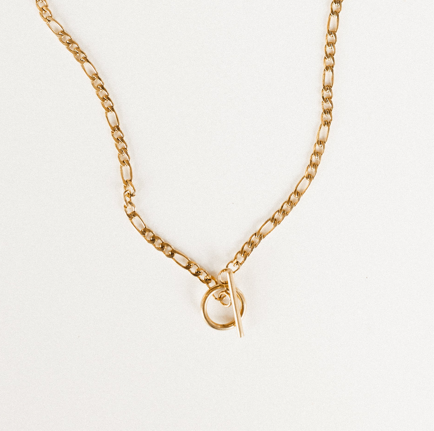 Gold figaro toggle clasp necklace