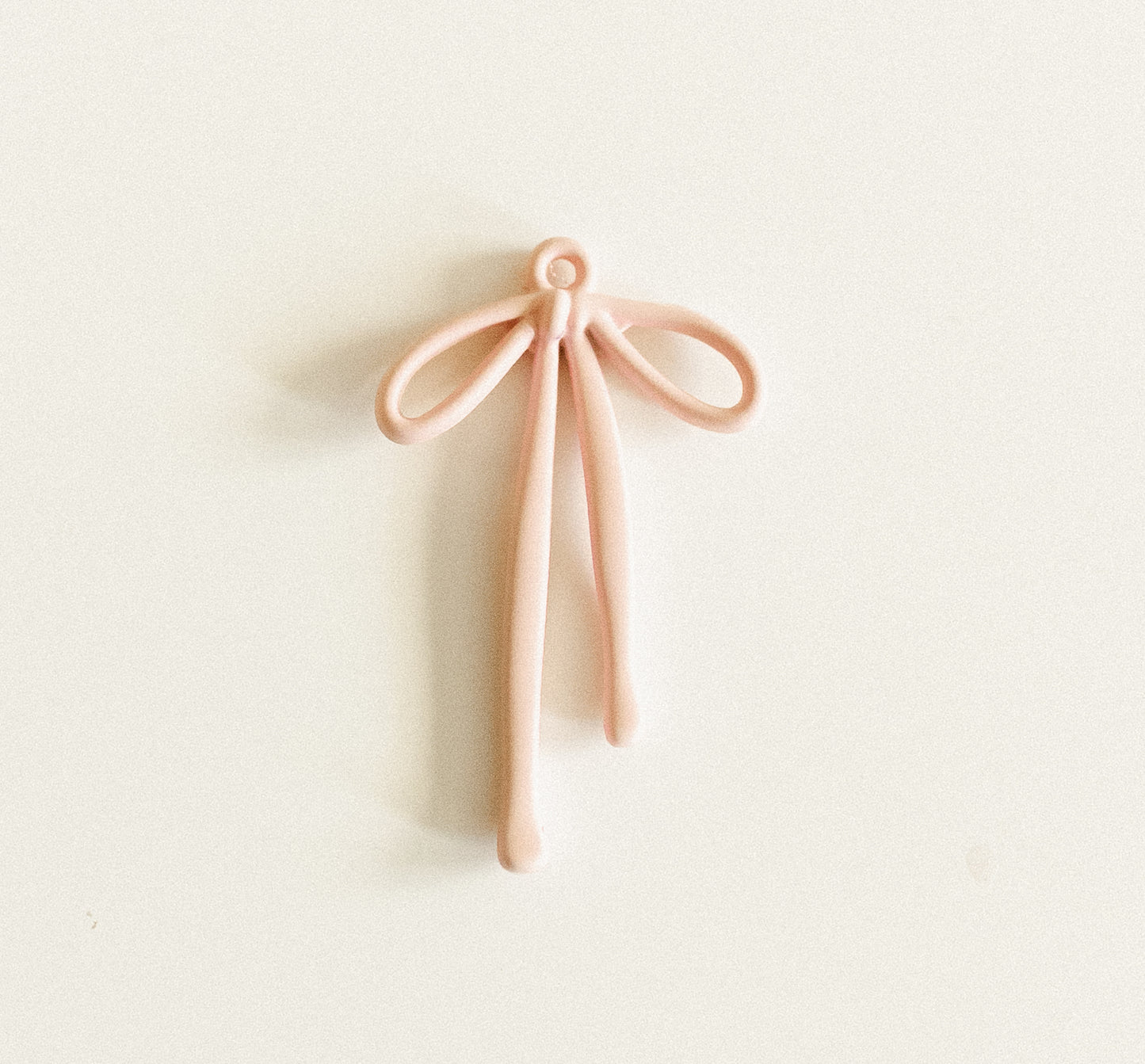 Large pink droopy bow