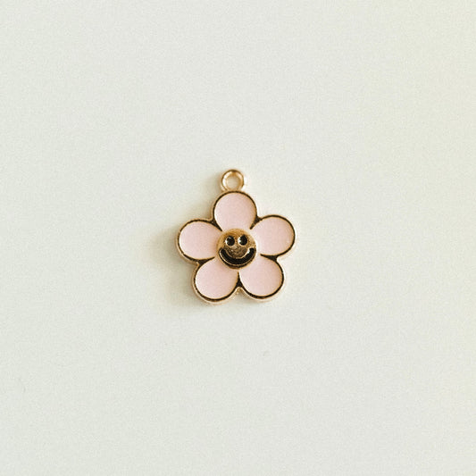 Gold pink smiley flower