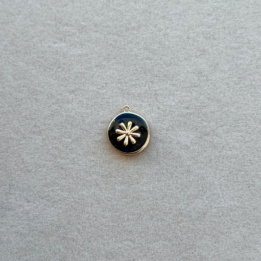 Gold black circle flower