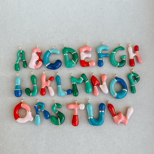 Large gold colored bubble letters A-Z