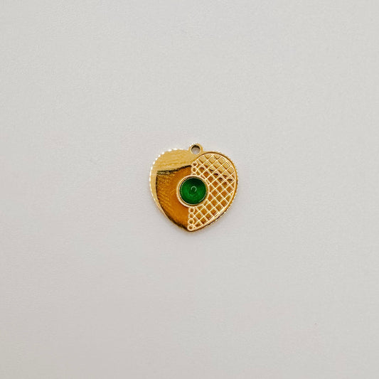 Gold heart with green gem