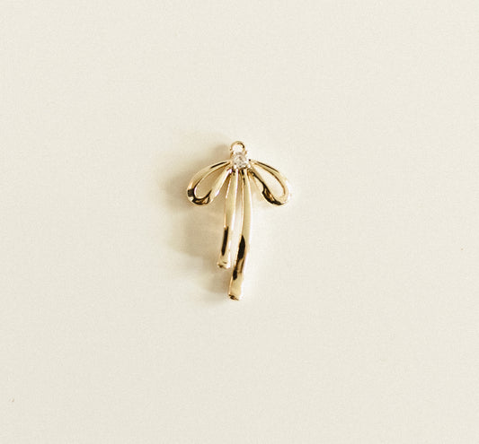 Small gold bow w/diamond