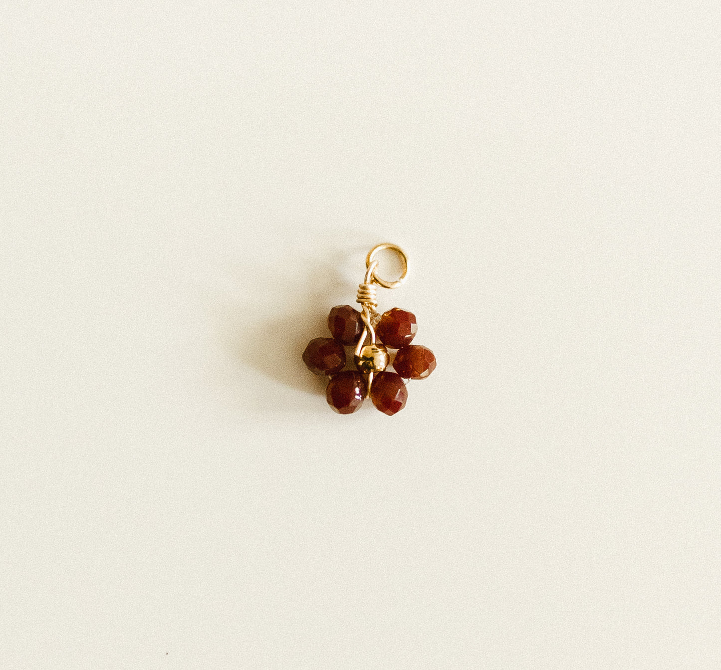 Small burgundy bead flower